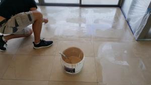 Applying a polyester grout for a seamless finish
