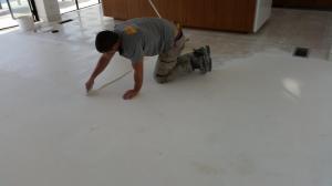 Applying a second coat to fill any fine holes so the limestone will be easier to maintain