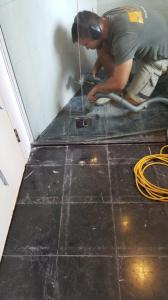 Black Marble - Removing the grout and applying a polyester resin for a seamless finish