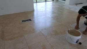 Regrouting the travertine  and filling any fine holes with a polyester epoxy