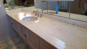 Travertine vanity with a polished finish