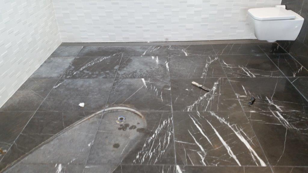 Marble bathroom before a full restoration